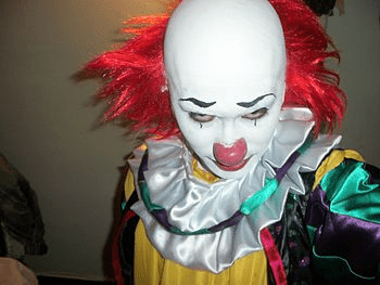 A close-up of spooky DIY Pennywise the Clown makeup and costume for Halloween party inspiration on Kayoubi Muse.