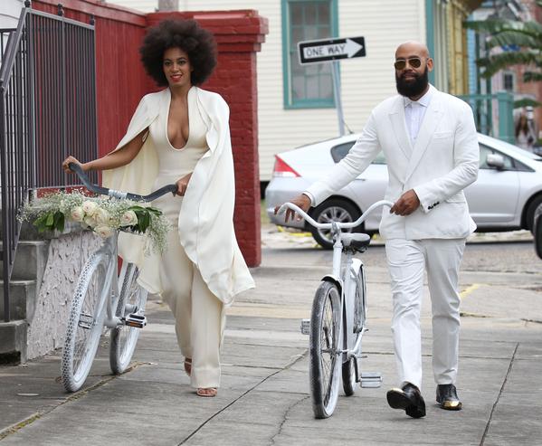 Solange Knowles Solange Knowles and Alan Ferguson riding white bicycles together.