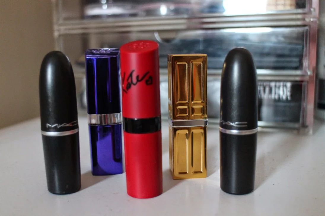 Best red lipsticks collection flatlay with MAC and Rimmel lipsticks