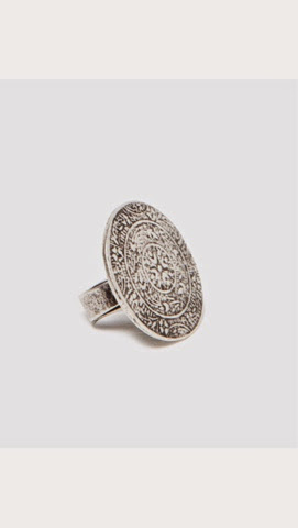 Zara Sculptural Round Ring Zara minimal round statement ring on marble background