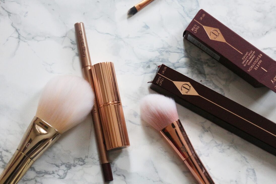 Swatch of Charlotte Tilbury Glastonberry lipstick on skin